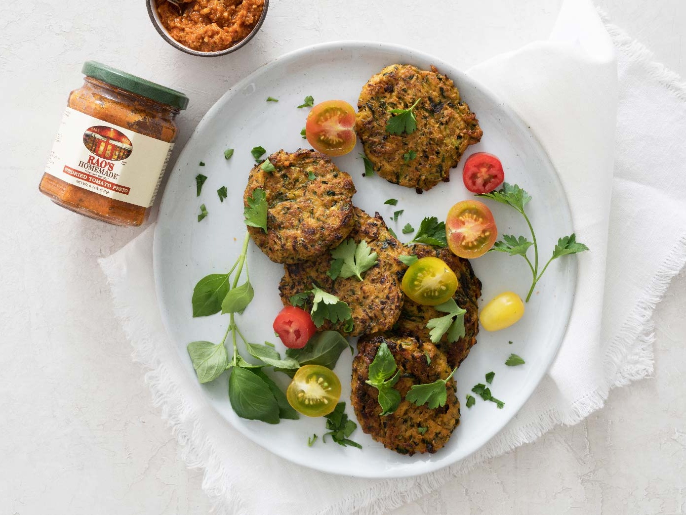 Zucchini fritters with sundried tomato pesto