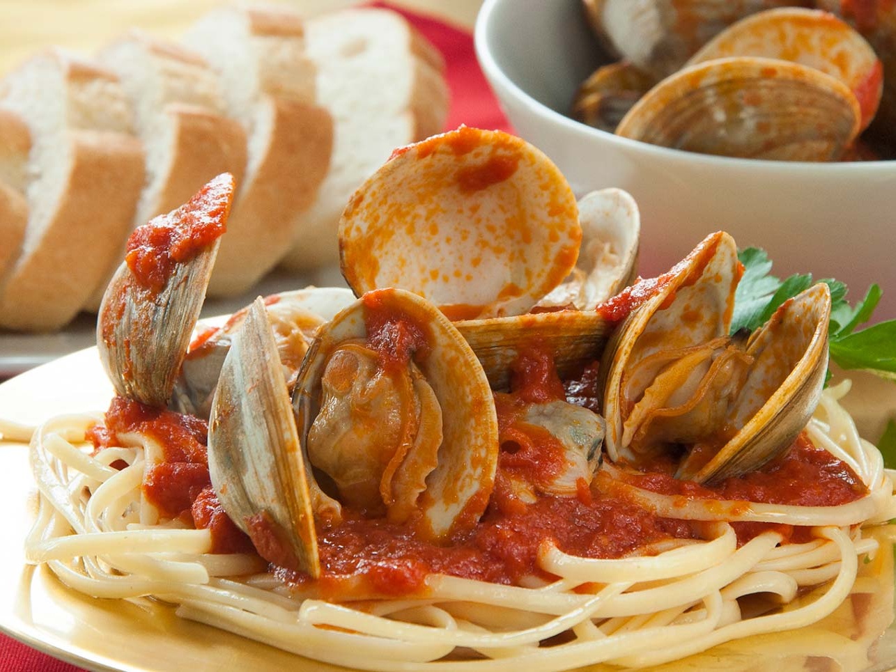 Clams over linguine with red sauce