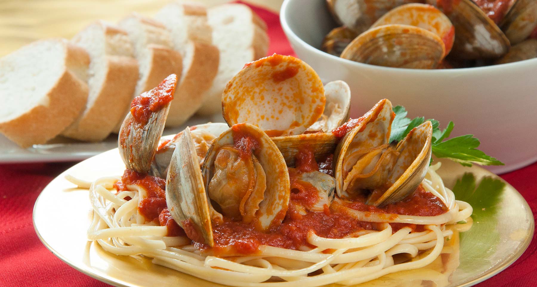 Clams over linguine with red sauce