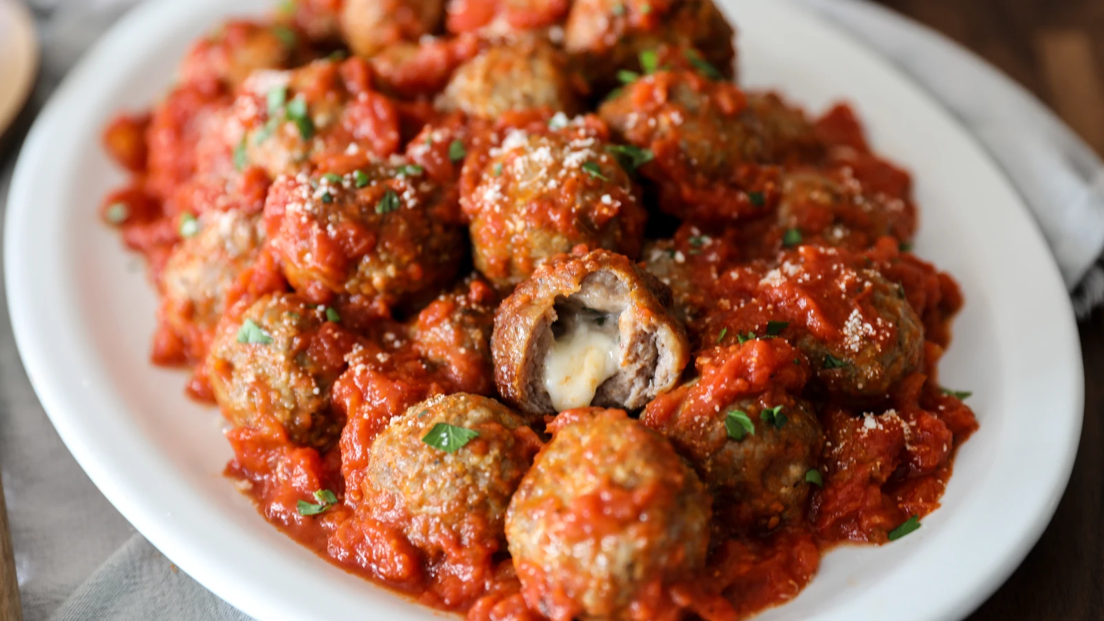 Stuffed meatballs with tomato sauce and herbs