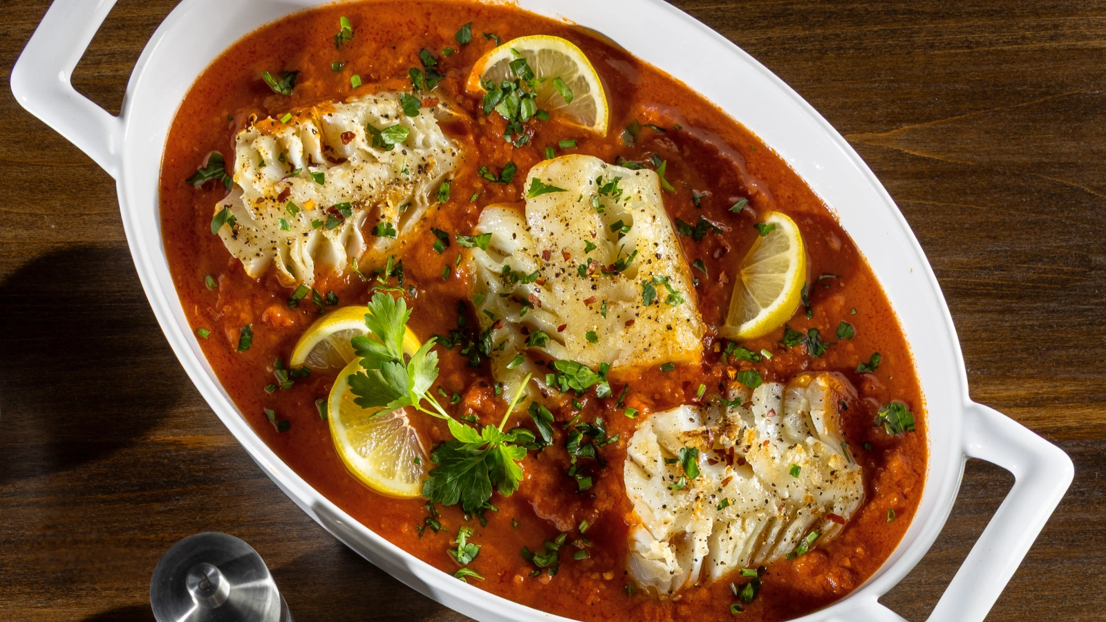 Baked cod with lemon Parmesan sauce
