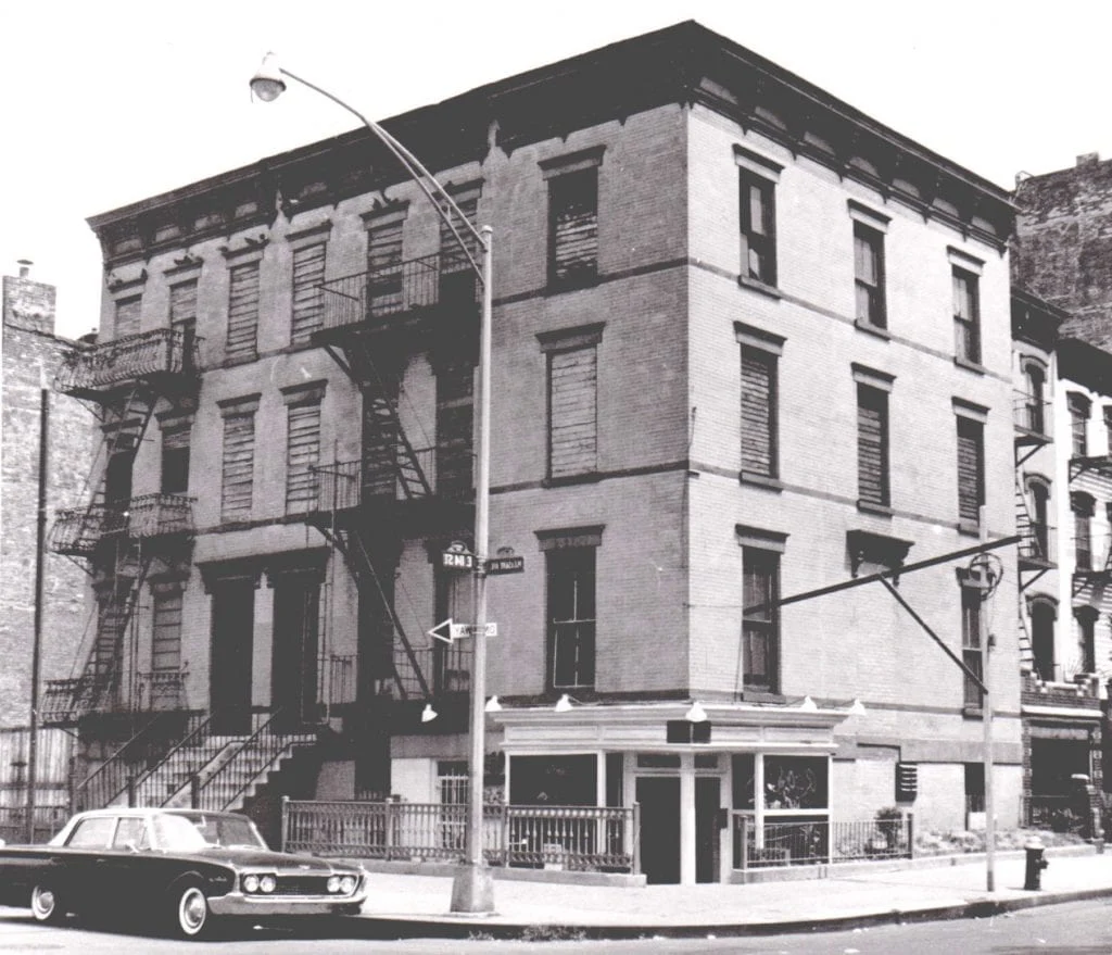 Historic photograph of the Rao's restaurant building.
