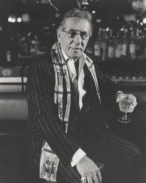Historic portrait of Frank Pellegrino, Sr. from the Rao's restaurant history timeline.