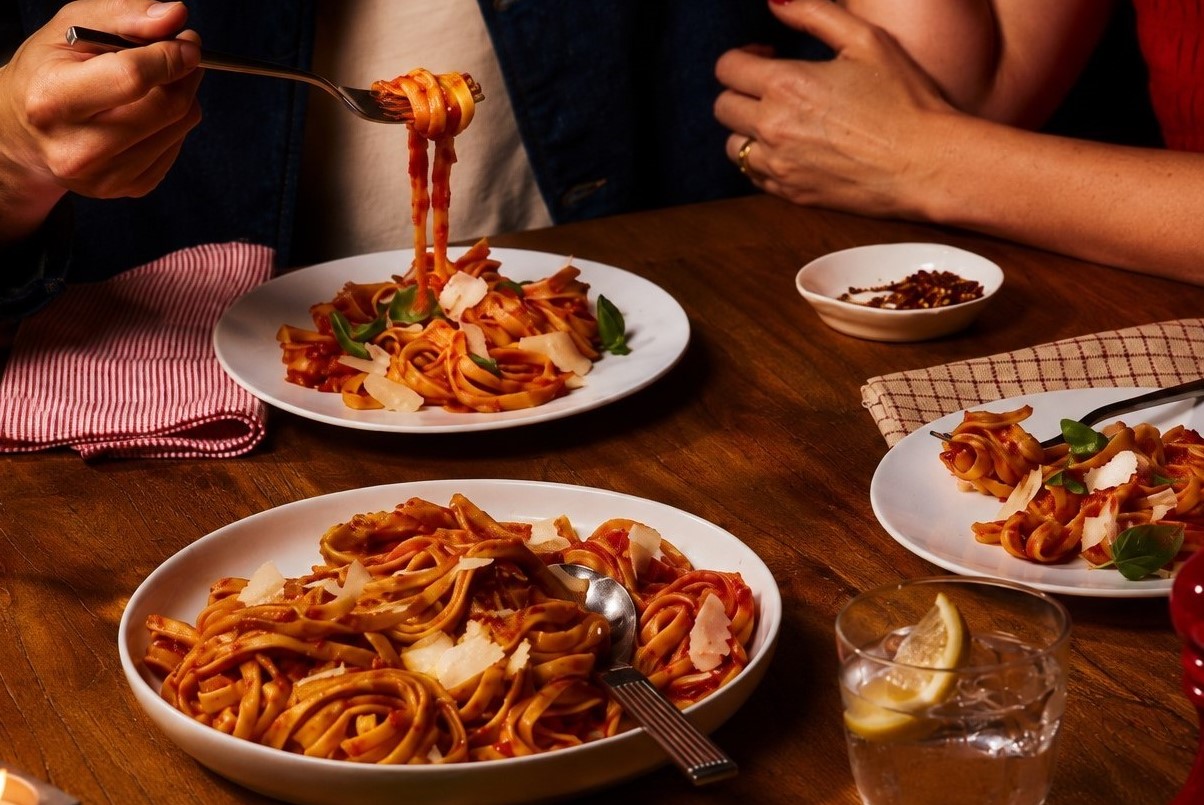 Authentic Italian-style pasta with Rao's® tomato sauce, Parmesan cheese, and fresh basil